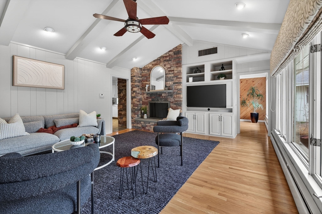 17 Karlton Circle Andover, MA 01810 - Photo 6 of 18 a living room with furniture and a flat screen tv