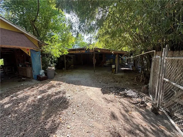 a backyard of a house with seating space