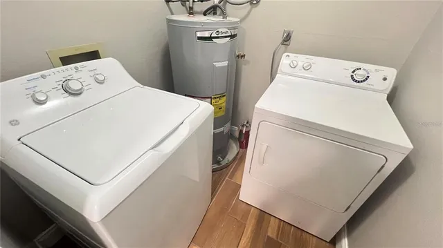a utility room with dryer and washer
