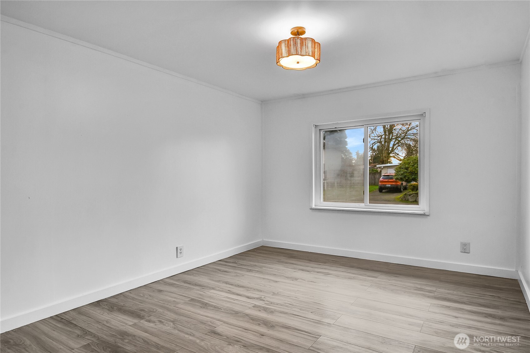 15771 119th Place Southeast Renton, WA 98058 - Photo 13 of 20 an empty room with a window