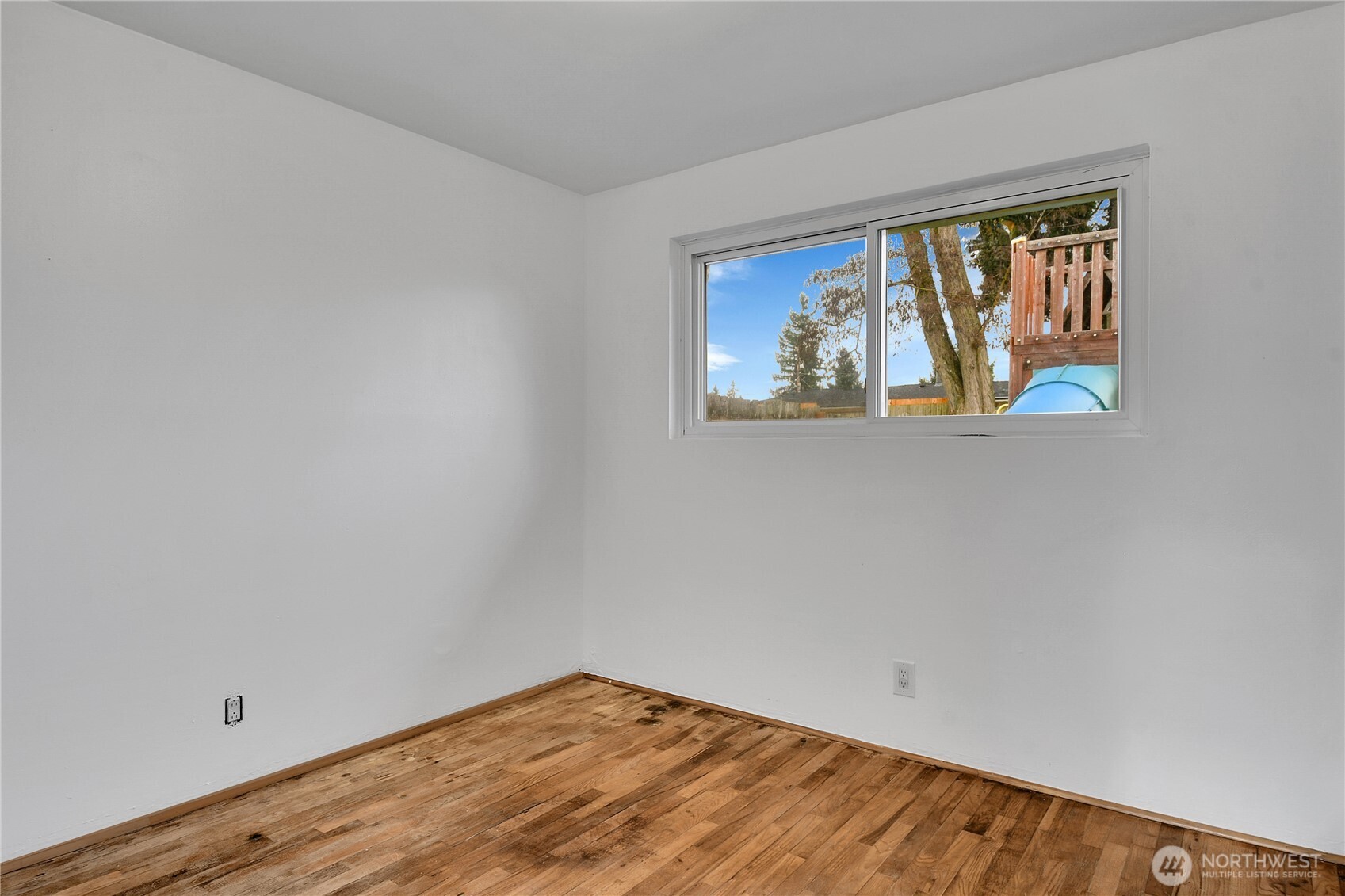 15771 119th Place Southeast Renton, WA 98058 - Photo 15 of 20 an empty room with window