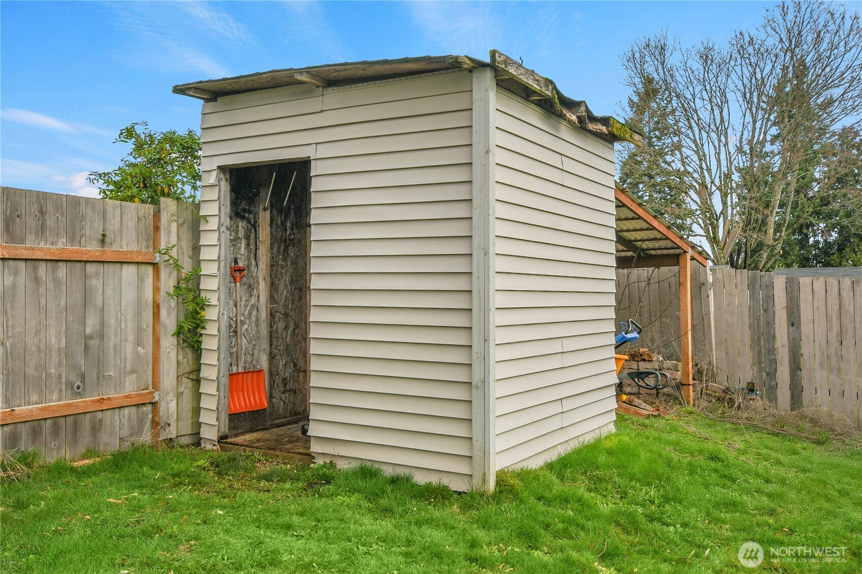 15771 119th Place Southeast Renton, WA 98058 - Photo 20 of 20 a front view of a house with a garden