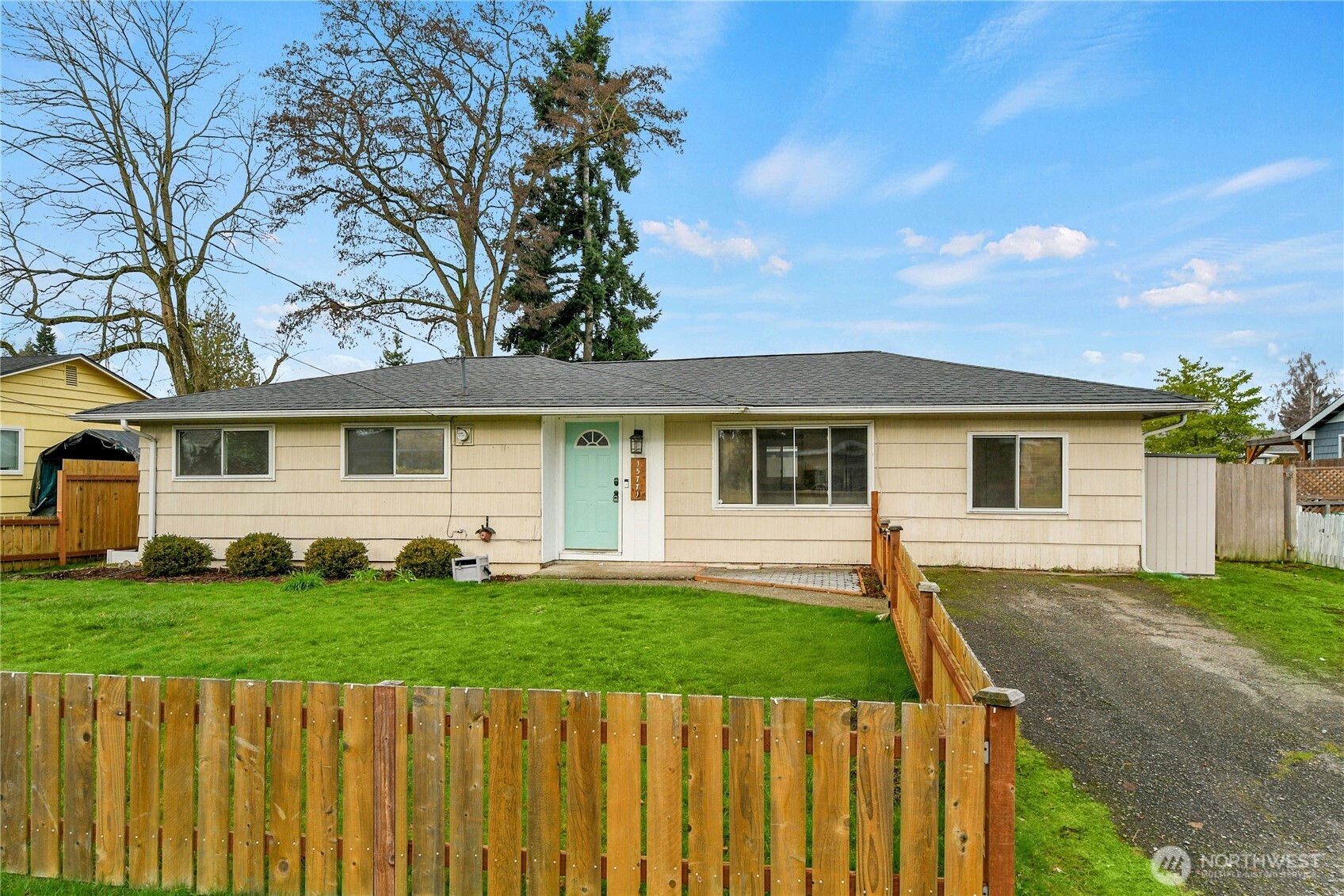 15771 119th Place Southeast Renton, WA 98058 - Photo 2 of 20 a front view of a house with a yard