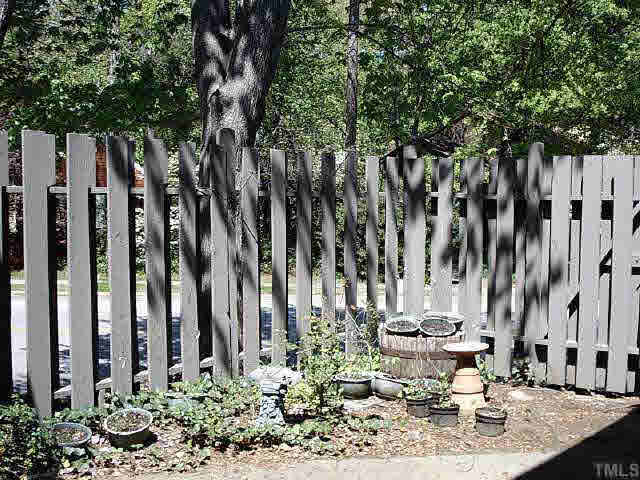 1786 Quail Ridge Road Raleigh, NC 27609 - Photo 2 of 10 PRIVACY FENCED 22X8 PATIO GREAT FOR THOSE FAMILY COOKOUTS*PLANTING BED TOO*WHAT MORE DO YOU NEED FOR OUTDOOR FUN? Other