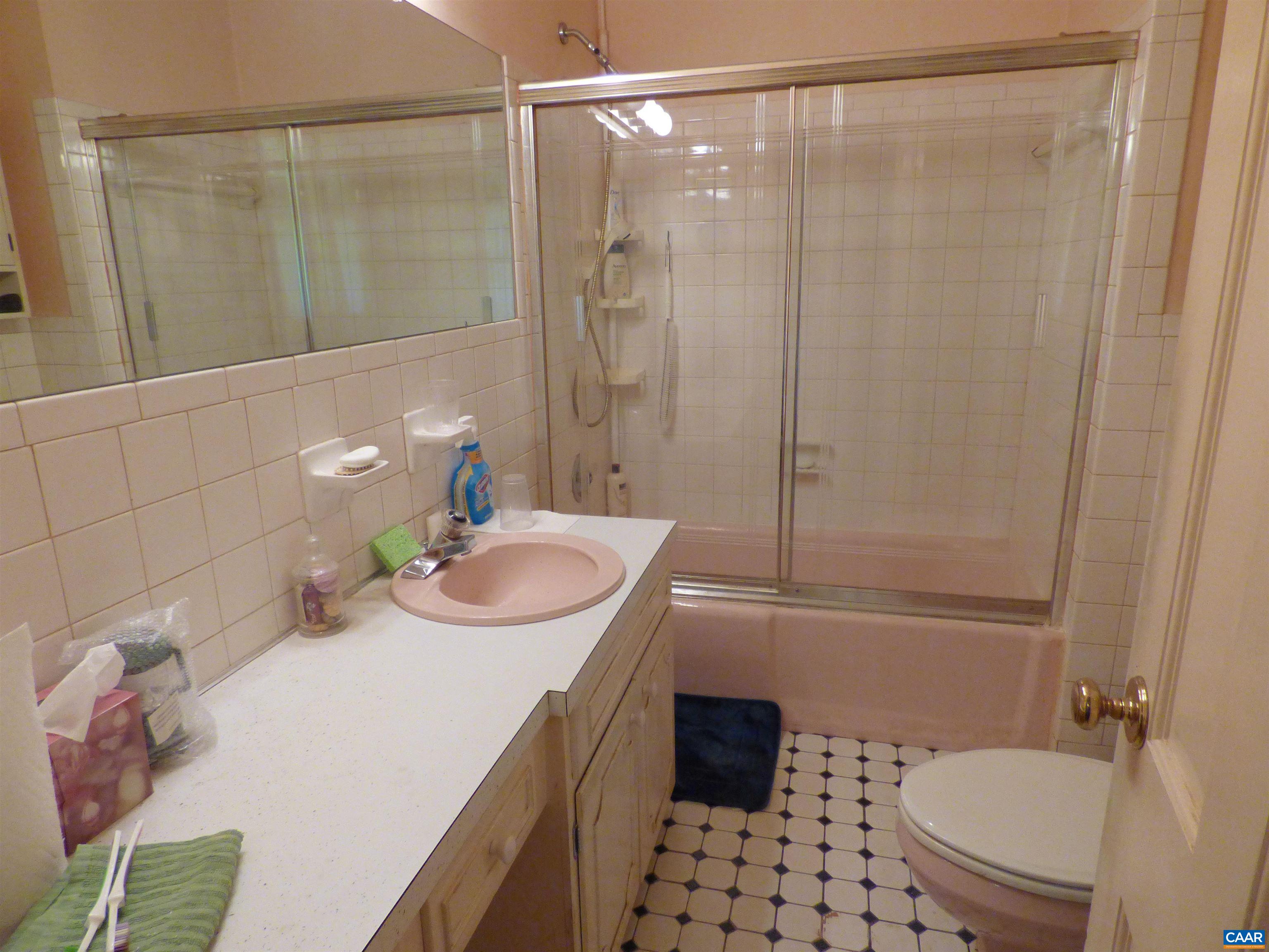 282 Kenmore Road Amherst, VA 24521 - Photo 14 of 33 a bathroom with a sink toilet and shower