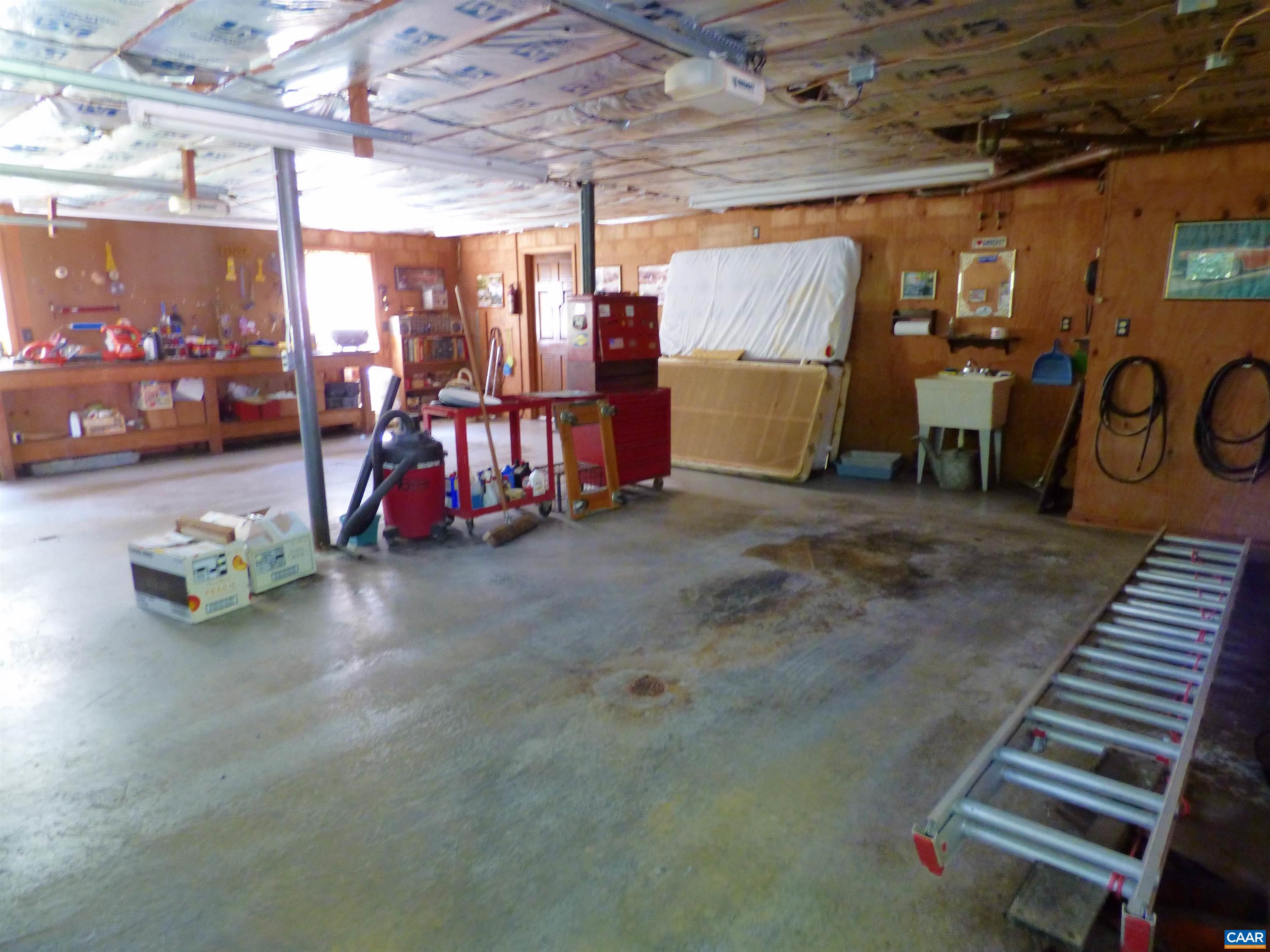 282 Kenmore Road Amherst, VA 24521 - Photo 27 of 33 a view of a garage with gym equipment