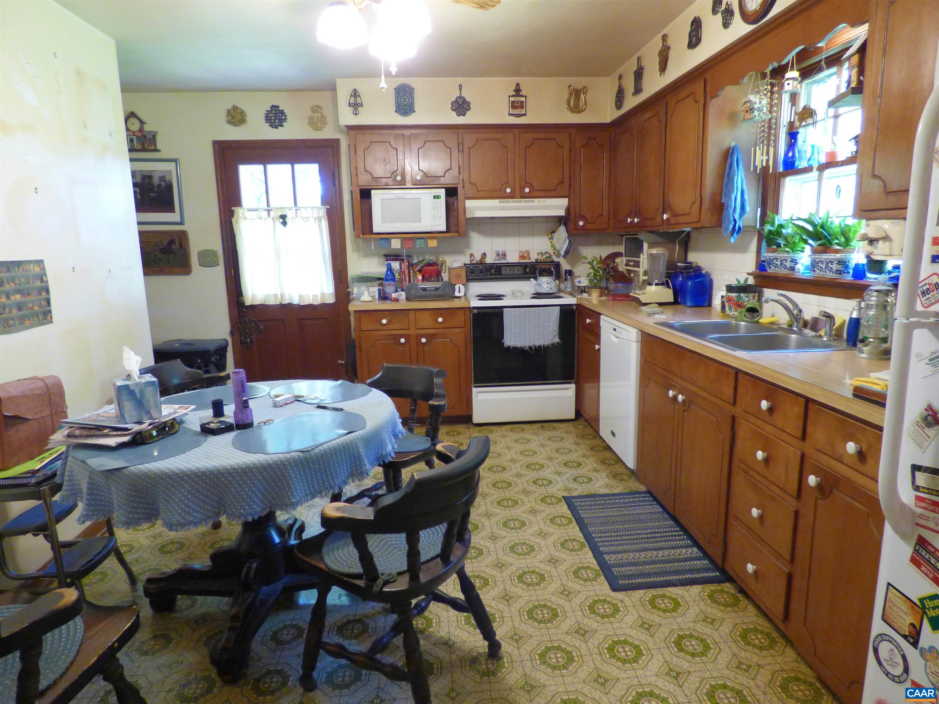 282 Kenmore Road Amherst, VA 24521 - Photo 8 of 33 a kitchen with a sink and cabinets