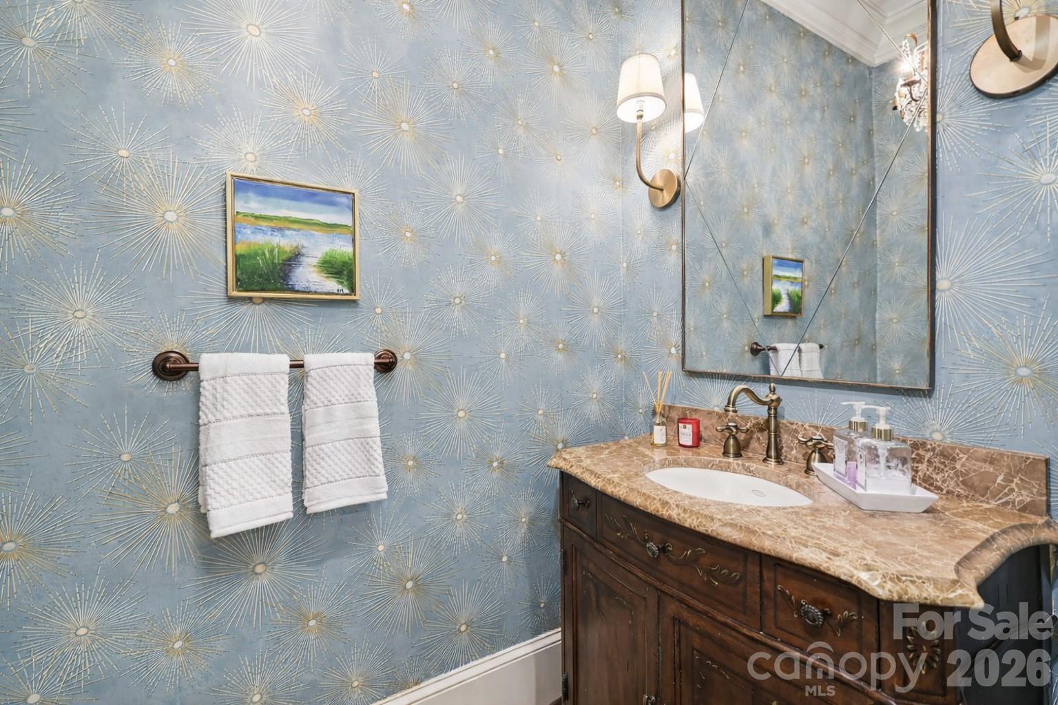 2744 Normandy Road Charlotte, NC 28209 - Photo 16 of 34 a bathroom with a sink vanity and mirror