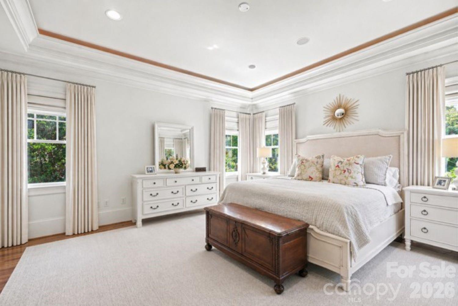 2744 Normandy Road Charlotte, NC 28209 - Photo 18 of 34 a spacious bedroom with a bed and a window