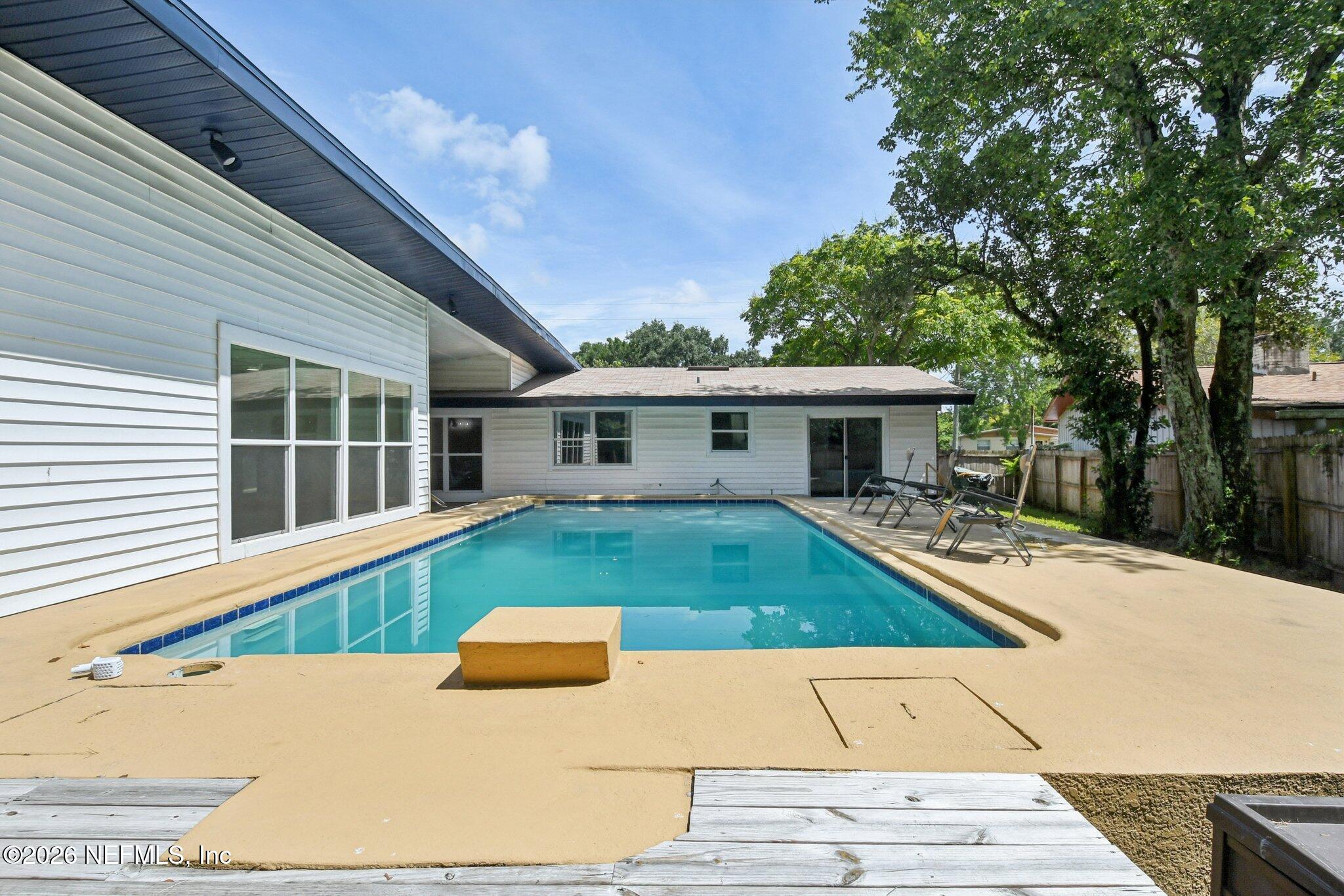 4079 Conga Street Jacksonville, FL 32217 - Photo 2 of 7 a view of a house with backyard and sitting area