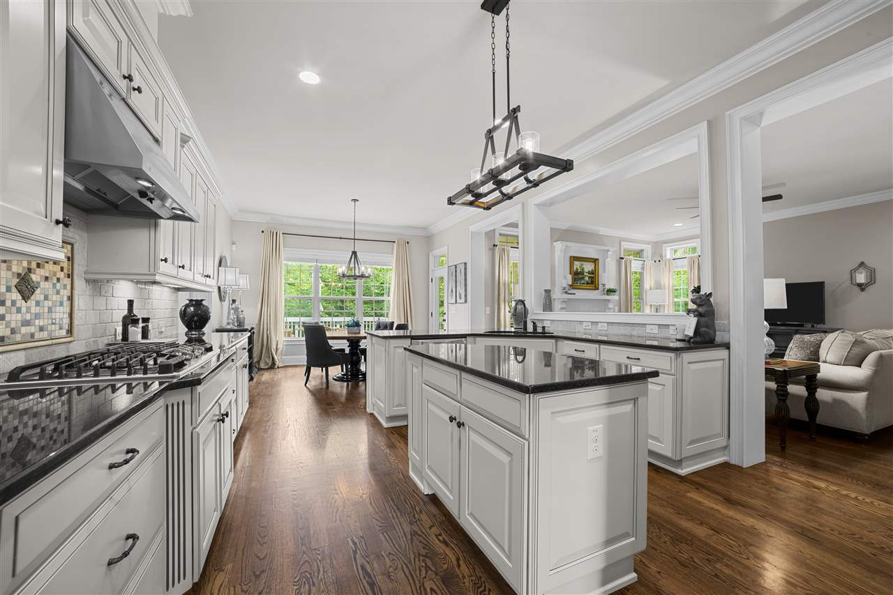 9120 Concord Hill Court Raleigh, NC 27613 - Photo 5 of 30 Island kitchen with gas cooktop, stainless steel appliances and soft close doors/drawers. Kitchen