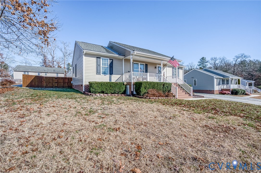 108 St Charles Place Aylett, VA 23009 - Photo 2 of 22 View of front of home with a porch and a shingled