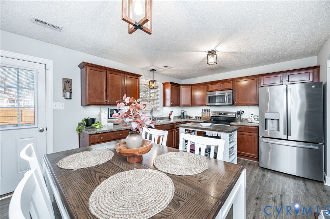 108 St Charles Place Aylett, VA 23009 - Photo 7 of 22 Kitchen featuring appliances with stainless steel