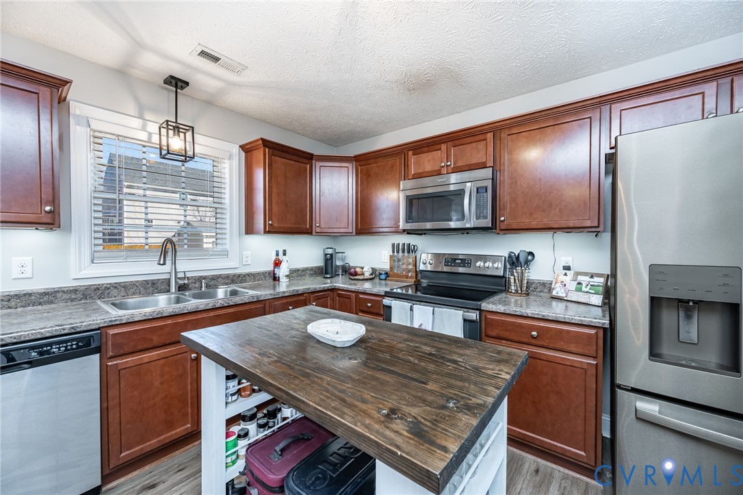 108 St Charles Place Aylett, VA 23009 - Photo 9 of 22 Kitchen featuring appliances with stainless steel