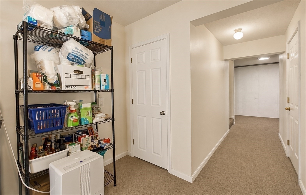 53 Century Way, Unit 53 Gardner, MA 01440 - Photo 21 of 22 a room with storage and utility