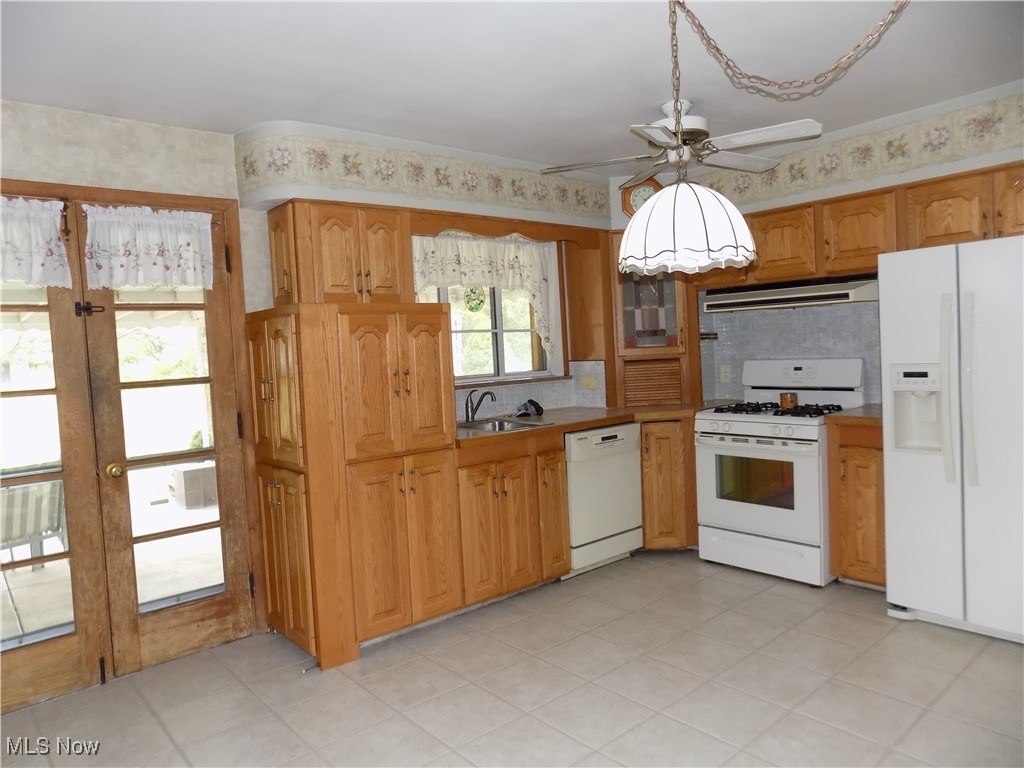 2380 West Pleasant Valley Road Parma, OH 44134 - Photo 5 of 38 Kitchen featuring white appliances, ceramic tile floor