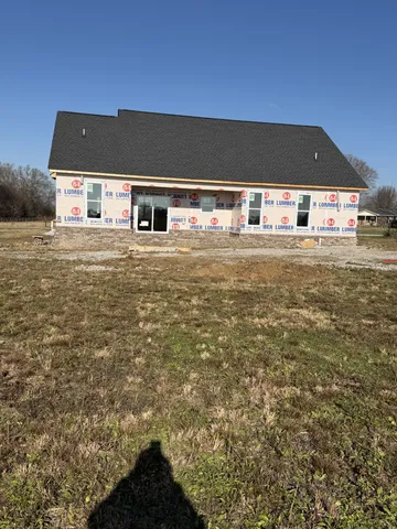 a front view of house with yard