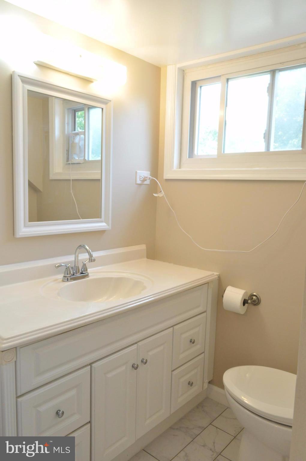 9903 Dilston Road Silver Spring, MD 20903 - Photo 18 of 24 Upper level half bath