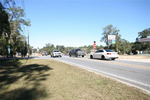 a view of car parked on the side of the road