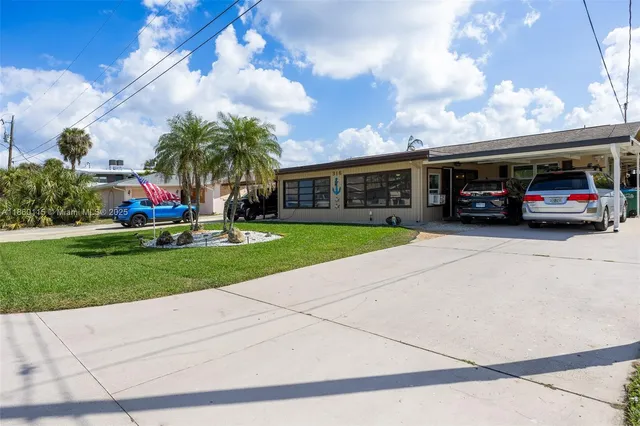 a view of a car in front of house