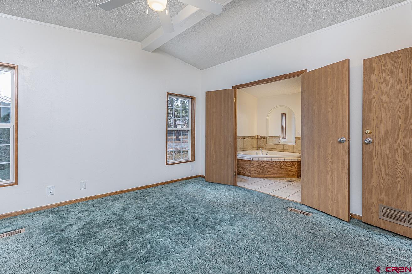 32 Hidden Lane Durango, CO 81303 - Photo 20 of 26 an empty room with closet area