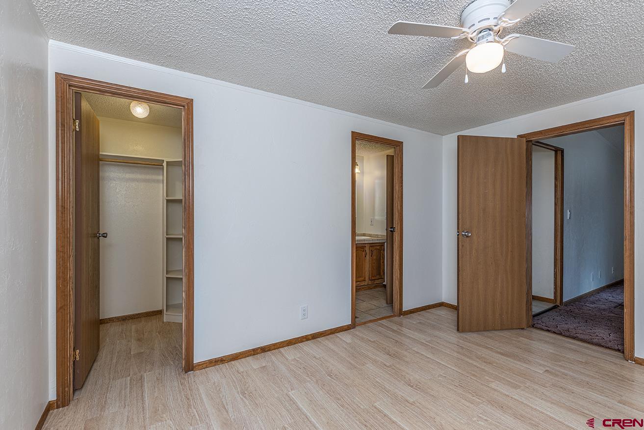 32 Hidden Lane Durango, CO 81303 - Photo 8 of 26 a view of empty room with wooden floor