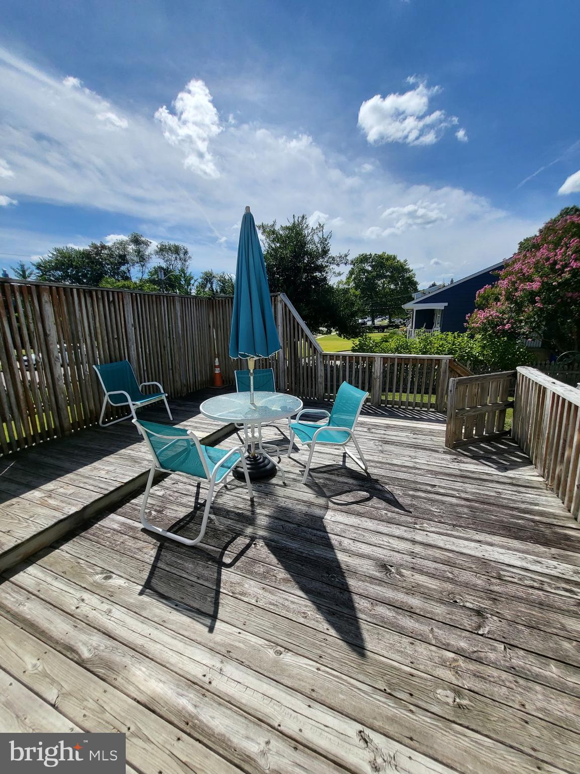 214 Chestnut Avenue Magnolia, NJ 08049 - Photo 12 of 16 a view of a roof deck with couches and sky view