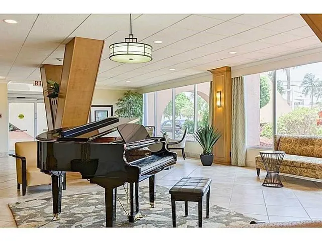 a view of a building with a yard