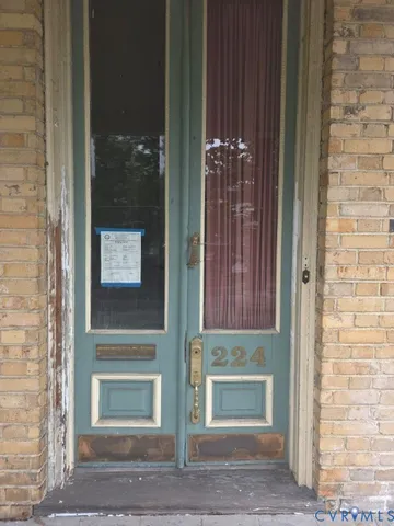 a front view of a house with glass door