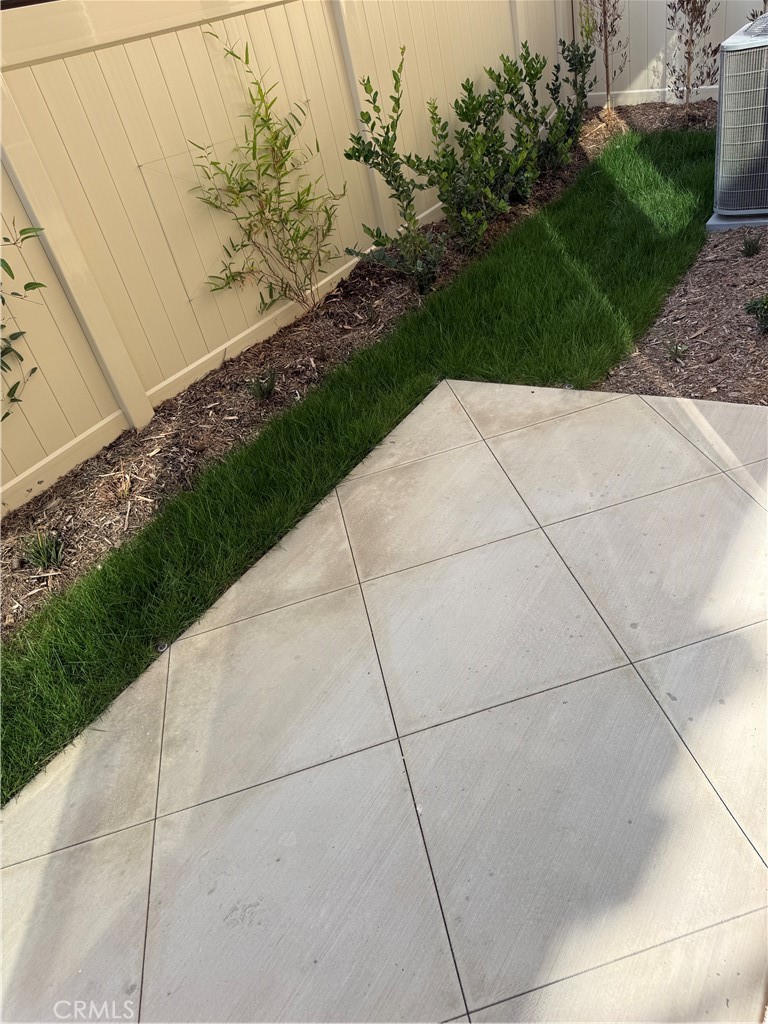 1120 Tropic Court, Unit 306 Redlands, CA 92374 - Photo 17 of 18 a view of backyard with garden
