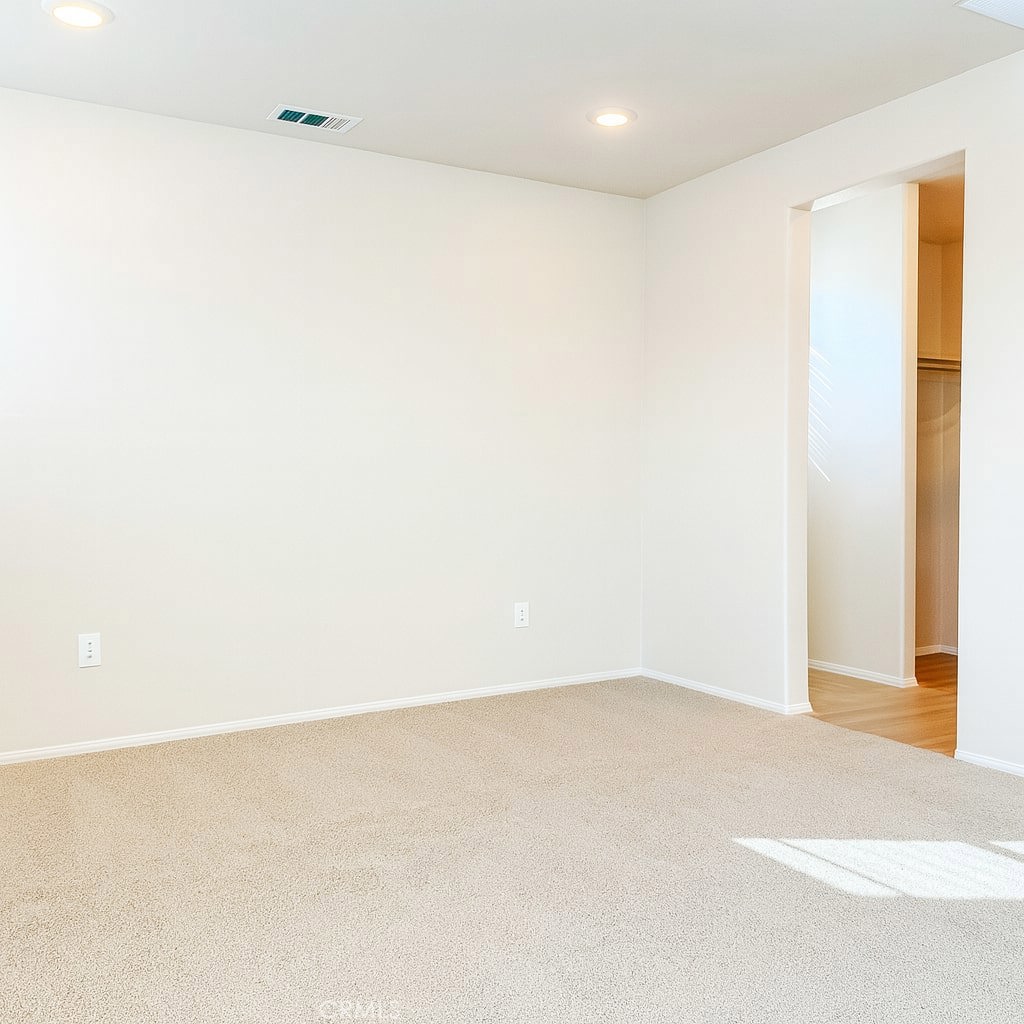 1120 Tropic Court, Unit 306 Redlands, CA 92374 - Photo 8 of 18 a view of an empty room
