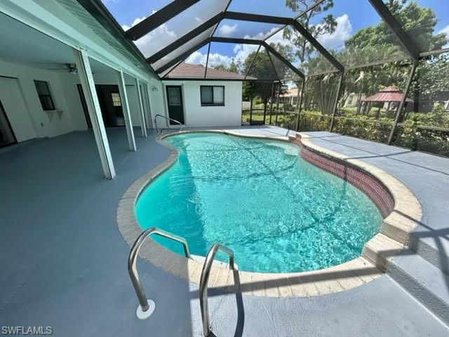 9115 Morris Road Fort Myers, FL 33967 - Photo 13 of 46 a view of a house with a backyard porch and sitting area