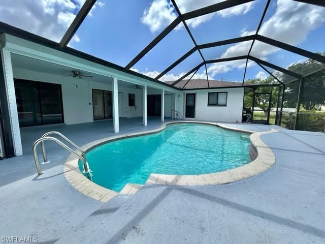 9115 Morris Road Fort Myers, FL 33967 - Photo 15 of 46 a view of a swimming pool with a patio