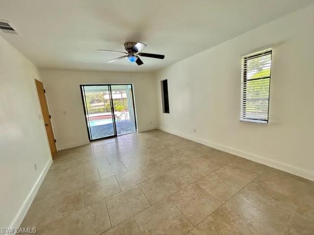 9115 Morris Road Fort Myers, FL 33967 - Photo 17 of 46 a view of an empty room with a window