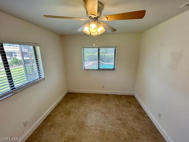 9115 Morris Road Fort Myers, FL 33967 - Photo 22 of 46 an empty room with a window
