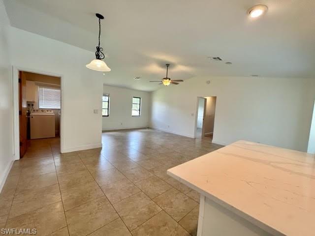 9115 Morris Road Fort Myers, FL 33967 - Photo 23 of 46 a view of livingroom with hardwood floor and a ceiling fan