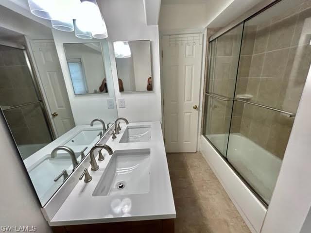 9115 Morris Road Fort Myers, FL 33967 - Photo 24 of 46 a bathroom with a sink and mirror