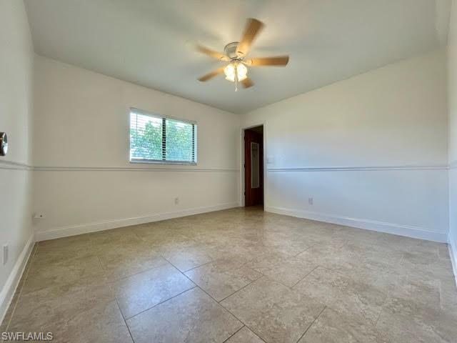 9115 Morris Road Fort Myers, FL 33967 - Photo 28 of 46 a view of an empty room with a window