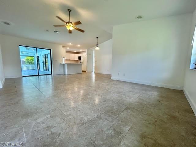 9115 Morris Road Fort Myers, FL 33967 - Photo 31 of 46 wooden floor in an empty room with a window