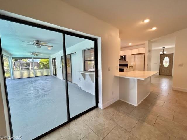 9115 Morris Road Fort Myers, FL 33967 - Photo 32 of 46 a view of a kitchen cabinets and windows