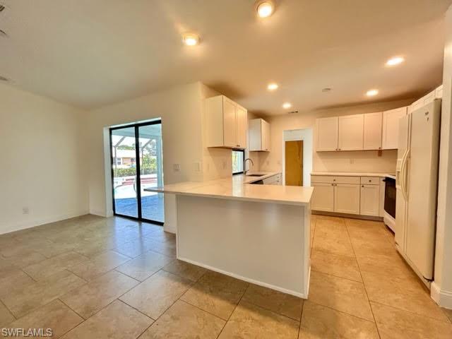 9115 Morris Road Fort Myers, FL 33967 - Photo 33 of 46 a view of kitchen with wooden floor