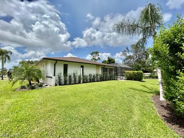 9115 Morris Road Fort Myers, FL 33967 - Photo 4 of 46 a view of a yard in front of house