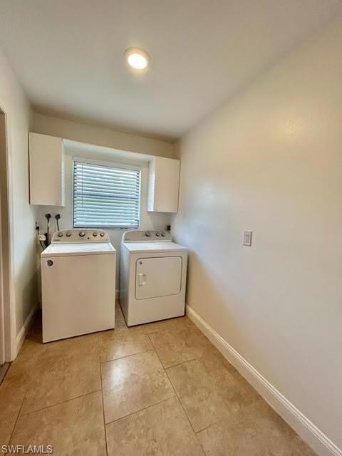 9115 Morris Road Fort Myers, FL 33967 - Photo 45 of 46 a utility room with a washer and dryer