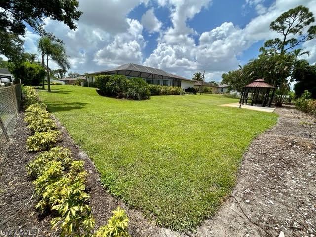 9115 Morris Road Fort Myers, FL 33967 - Photo 46 of 46 a view of a house with a big yard