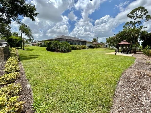 9115 Morris Road Fort Myers, FL 33967 - Photo 8 of 46 a view of a house with a big yard