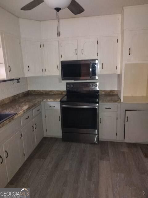 46 Mohawk Trail Ringgold, GA 30736 - Photo 5 of 16 a kitchen with cabinets appliances and a counter space