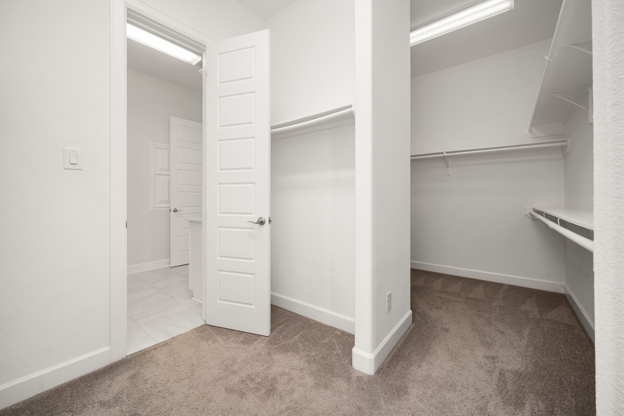 3622 Sage Hollow Drive Spring, TX 77386 - Photo 20 of 46 The walk-in closet is split into distinct storage zones with built-in multi-level hanging racks, providing incredible spatial organization for your wardrobe.