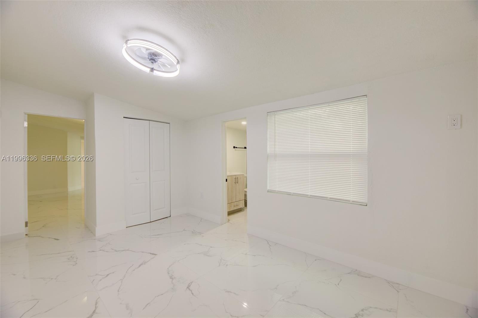 20201 Southwest 117th Court Miami, FL 33177 - Photo 3 of 18 an empty room with a empty space