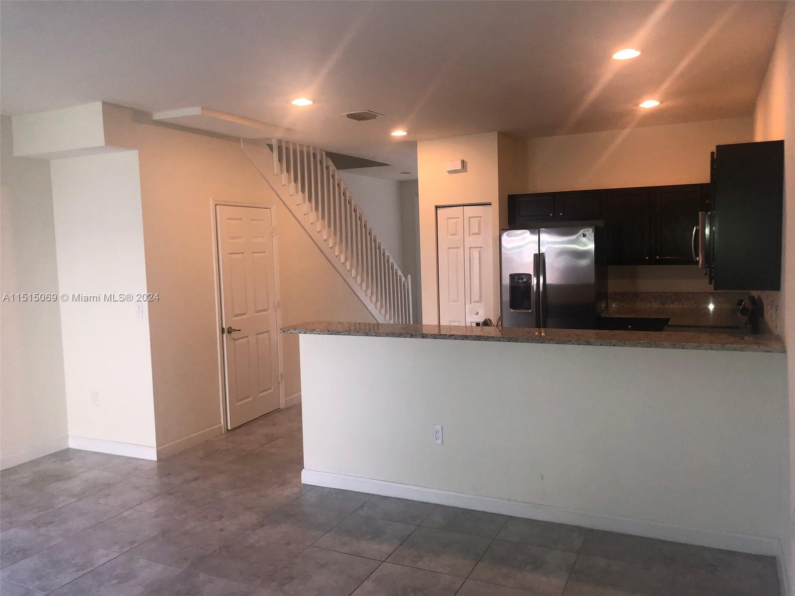 15053 Southwest 115th Terrace Miami, FL 33196 - Photo 16 of 29 a view of hallway with stairs