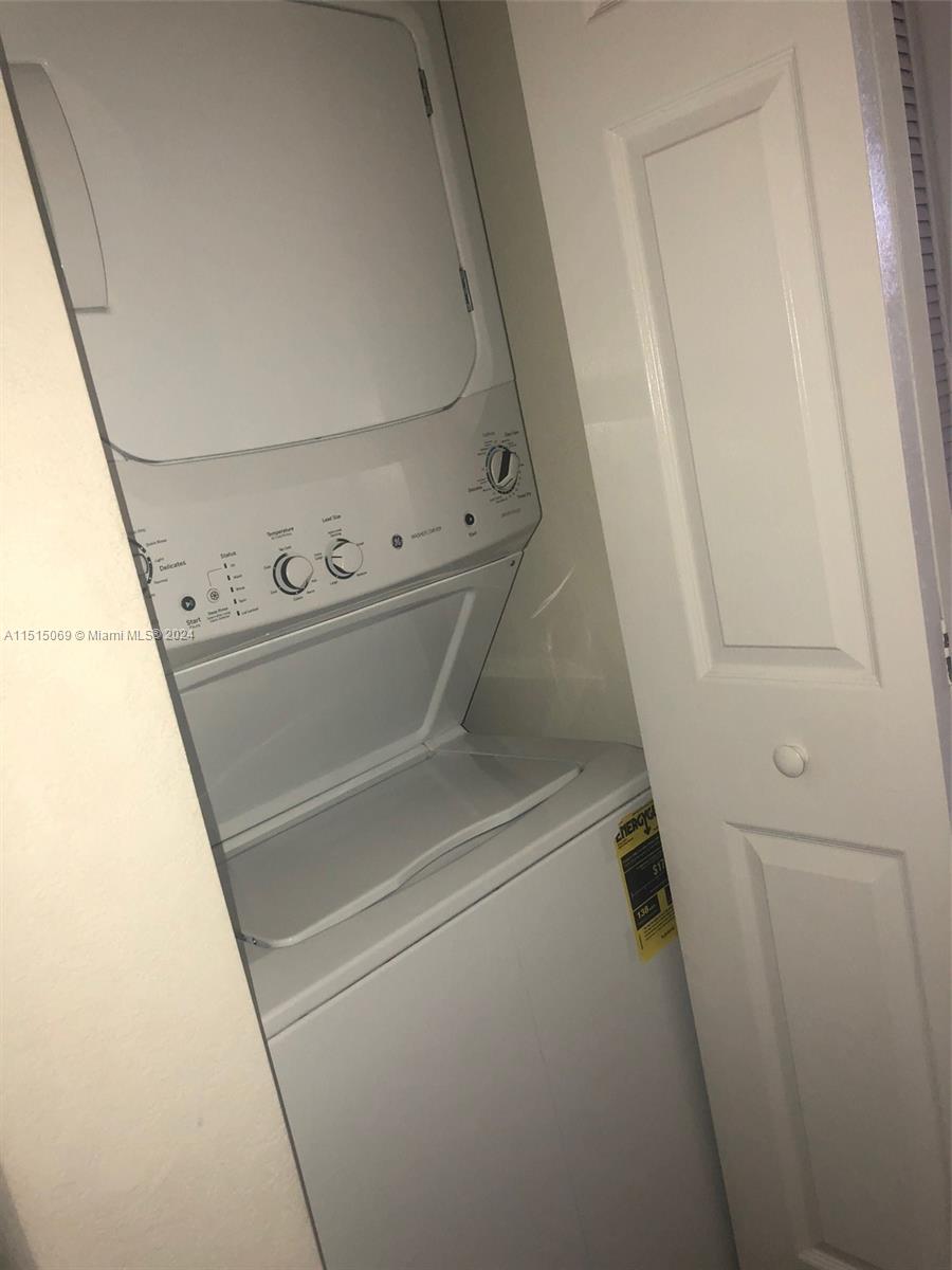 15053 Southwest 115th Terrace Miami, FL 33196 - Photo 23 of 29 a close up view of washer and dryer